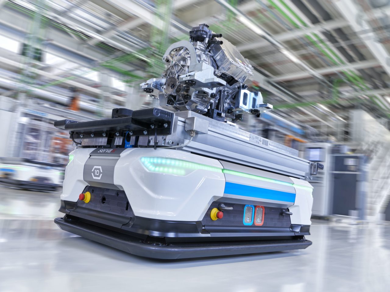 In the picture: driverless transport vehicle with a finished electric motor ...