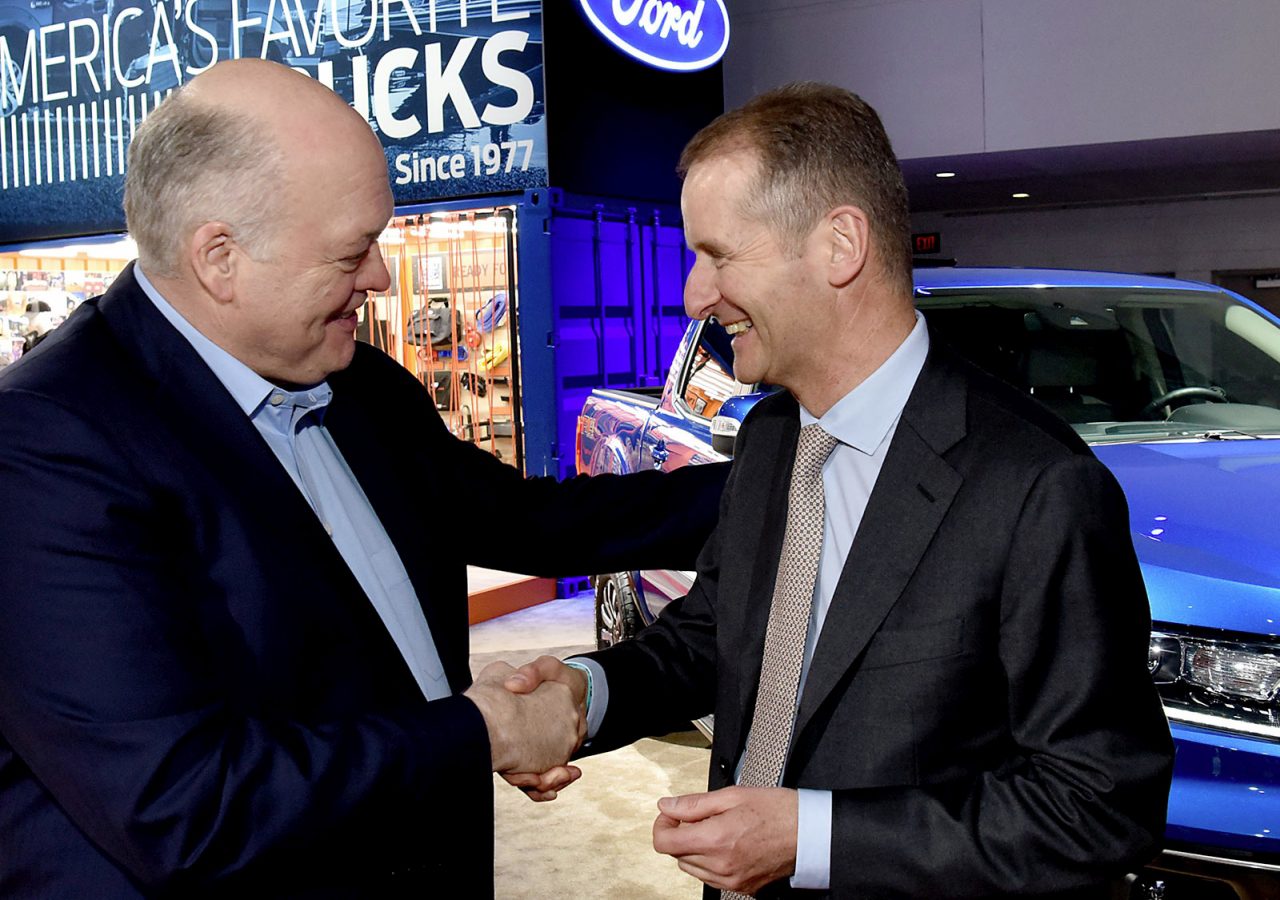 Volkswagen CEO Dr. Herbert Diess (right) and Ford CEO Jim Hackett. ...