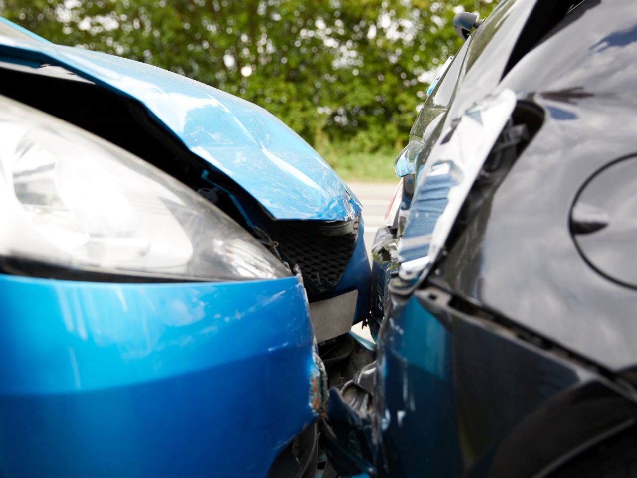 Close Up Of Two Cars Damaged In Road Traffic Accident ...