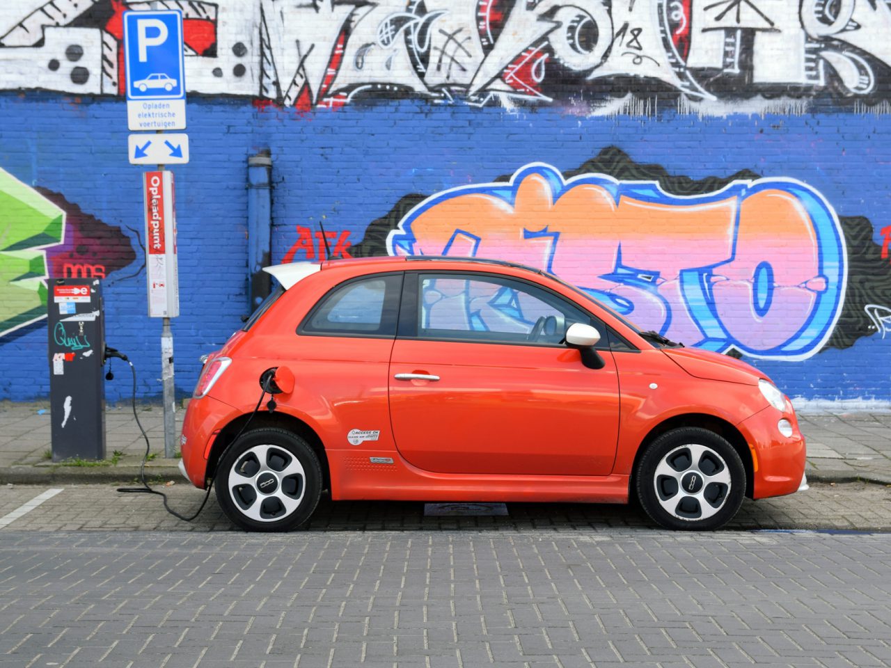Amsterdam, Netherlands - 16th April, 2018: Fiat 500e on the public electric char ...
